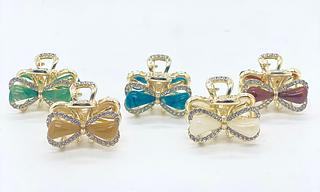 Presilha dourada formato laço strass (dúzia)